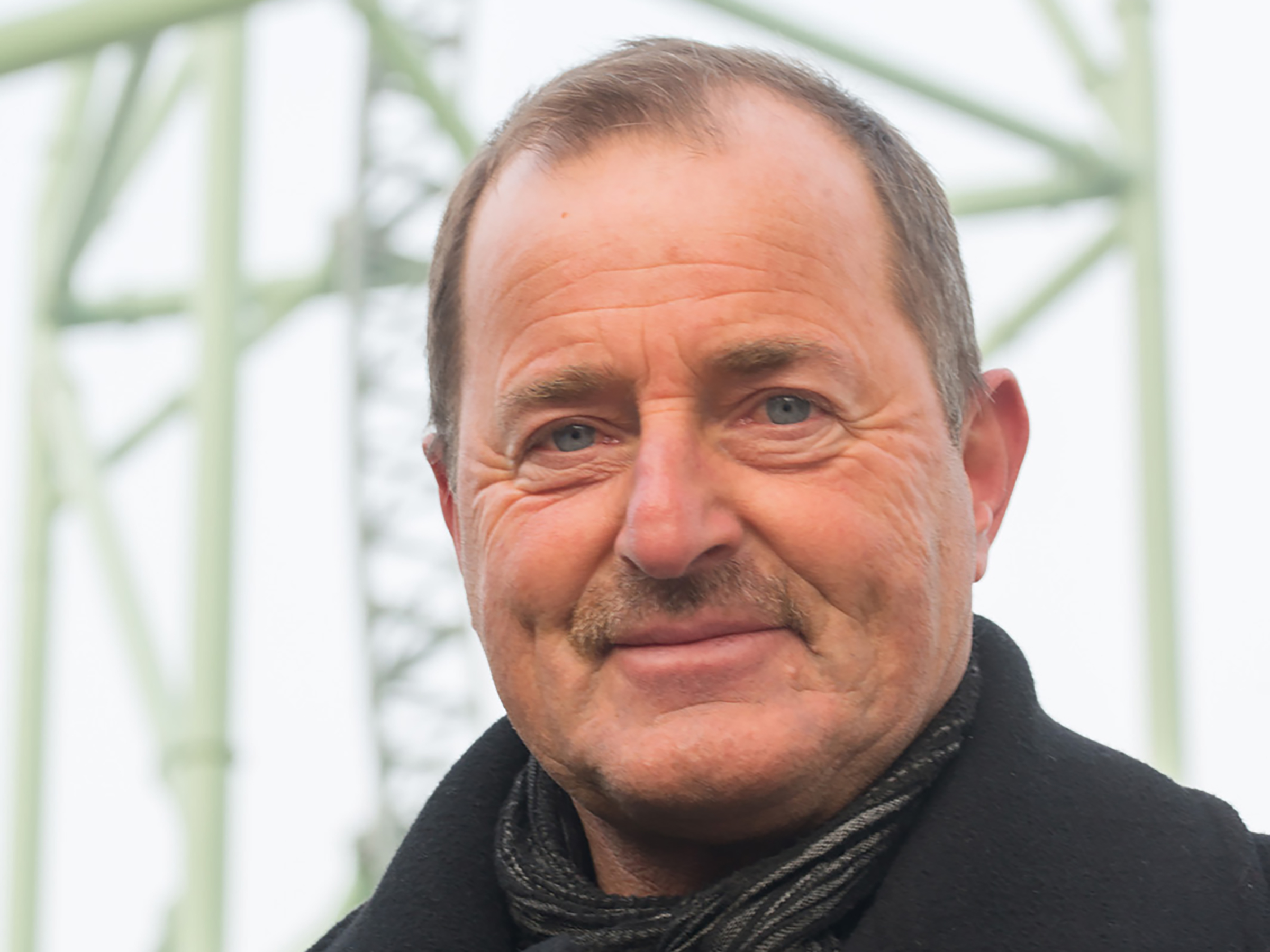 Portrait photograph of a middle-aged man